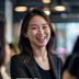 黑料网官网社区运营总监王思琪，女性，活力满满，正在与用户互动，背景明亮温馨